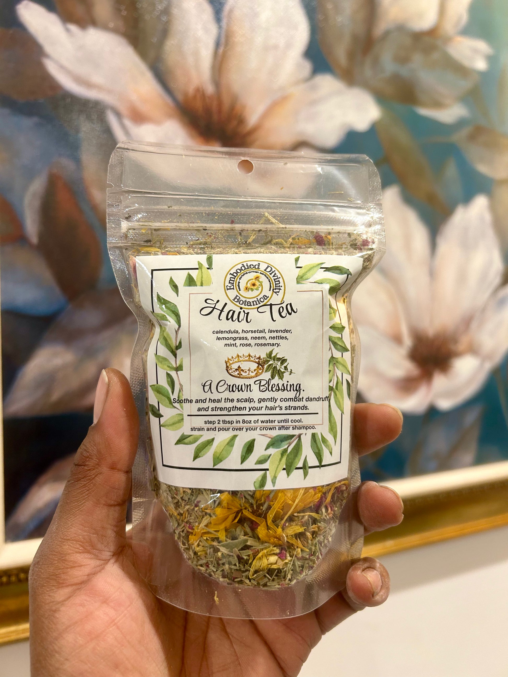 Packaged herbal hair tea blend with ingredients for scalp healing and spiritual cleansing